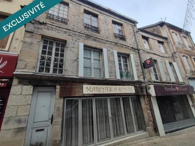 Immeuble à rénover avec beau potentiel