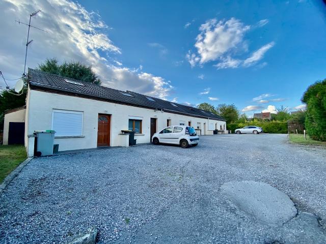 IMMEUBLE À VENDRE COMPRENANT 7 LOGEMENTS TOUS LOUÉS