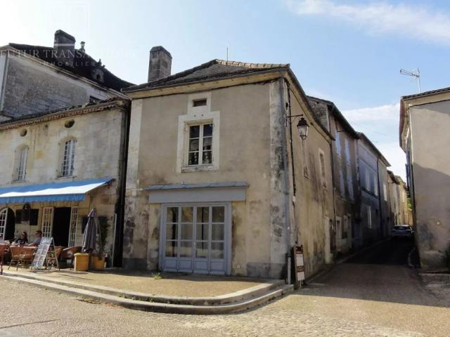 Immeuble avec local commercial