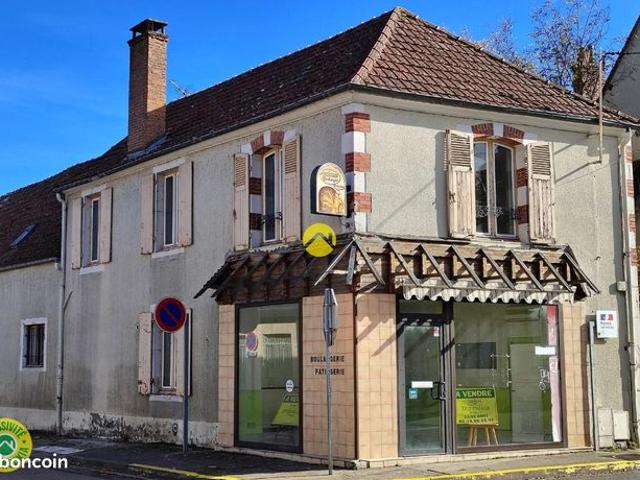 Immeuble commerce + habitation