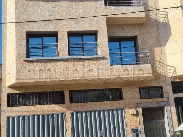 Immeuble commercial et habitation