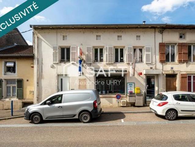 Immeuble de 200 m2 avec un grand garage !