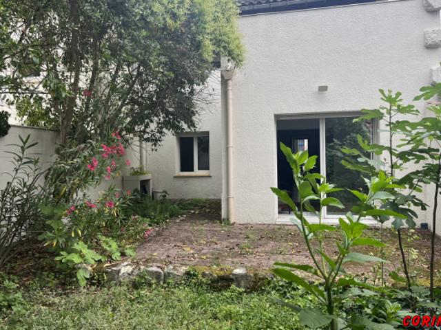 Immeuble de 2 appts jardin + garage
