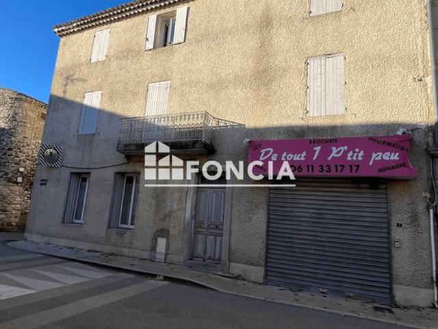 Immeuble de rapport Composé d’un local commercial et 4 Appartements loués