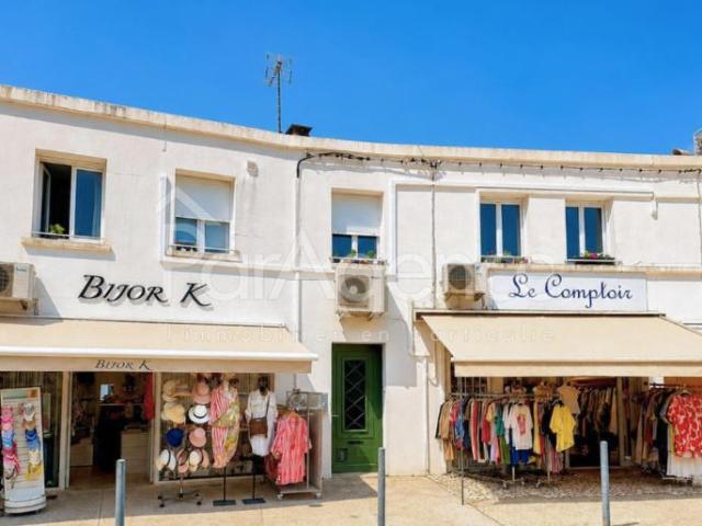 IMMEUBLE DE RAPPORT 2 COMMERCES LOUES ET UN APPARTEMENT LIBR