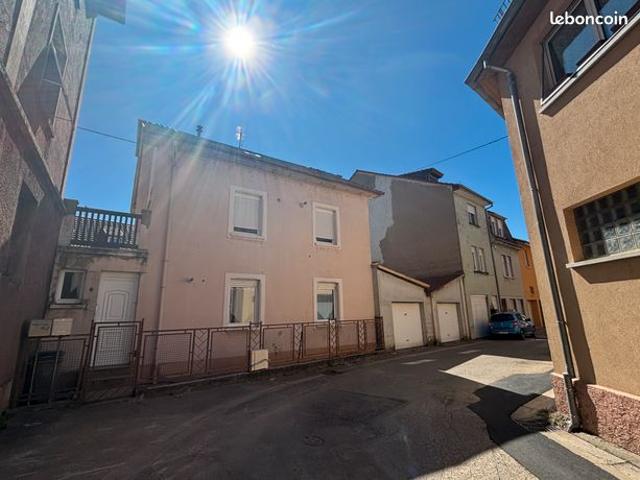 Immeuble de rapports de 2 appartements + 2 garages