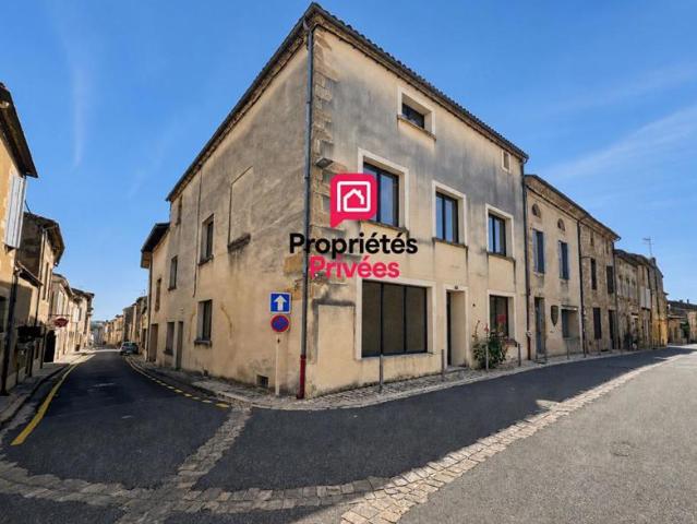 Immeuble en pierre avec garage, cour privative et fort potentiel d'aménagement