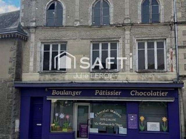 Immeuble locatif, situé à Loué 72540