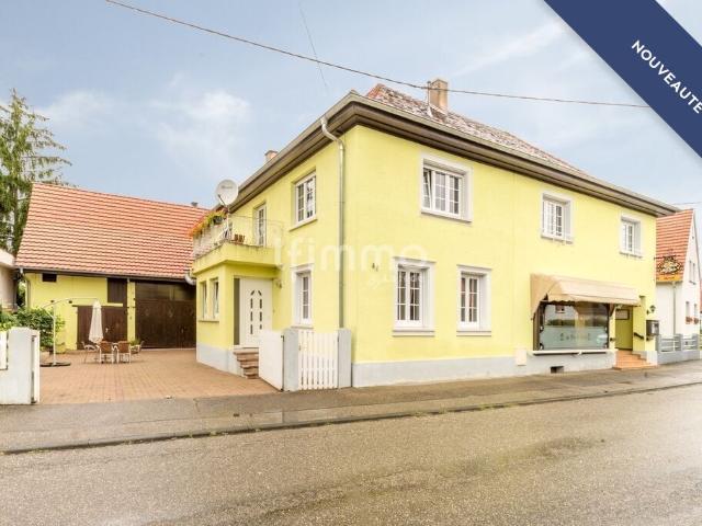Immeuble mixte 400m² + dépendances sur 20 ares