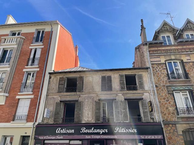 Immeuble mixte de commerce et d'habitation situé en plein Centre