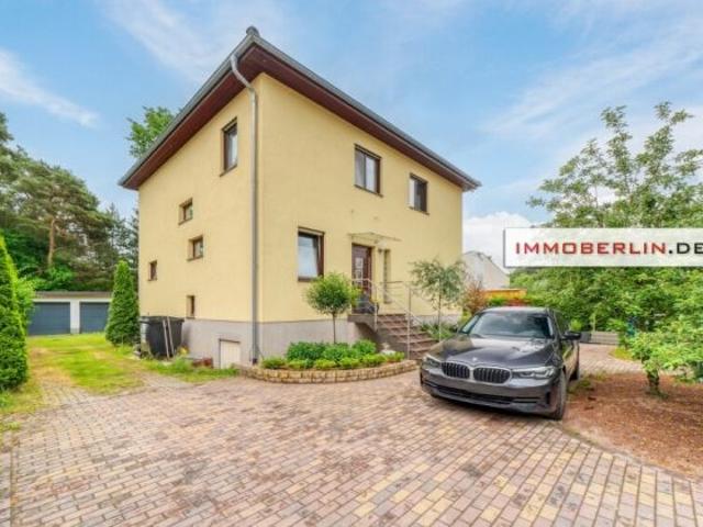 IMMOBERLIN.DE Exzellente Architektur mit separater Einliegerwohnung, Doppelgarage & Sonnengarten