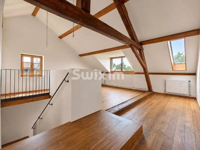 In Anières, a 6.5 room house in a fully renovated former dairy