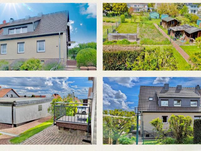 Individuelles Zweifamilienhaus mit großem Grundstück und Garage in bester Lage von Schauenburg Elg