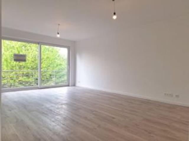 Instapklaar appartement met 2 slaapkamers en ondergrondse.
