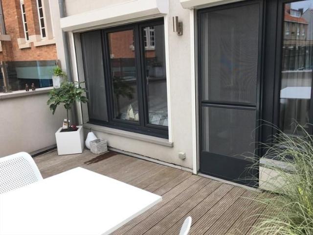 Instapklaar appartement met ruim terras in het hartje van Oo