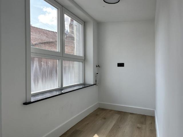 Instapklaar één slaapkamerappartement in het Sint Annakwartier te Brugge