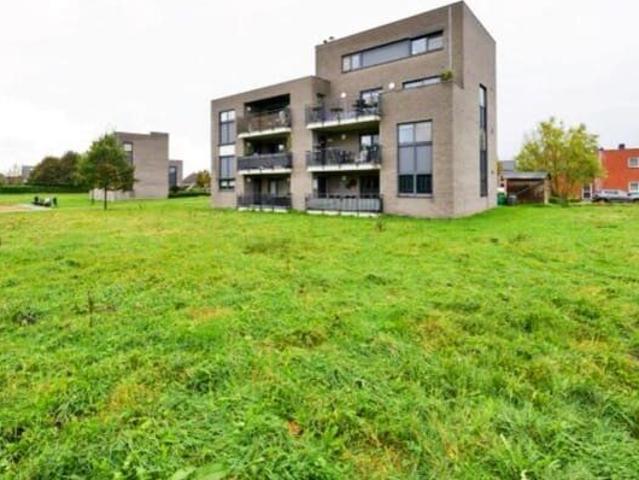 Instapklaar gelijkvloers appartement met overdekt zuidterras