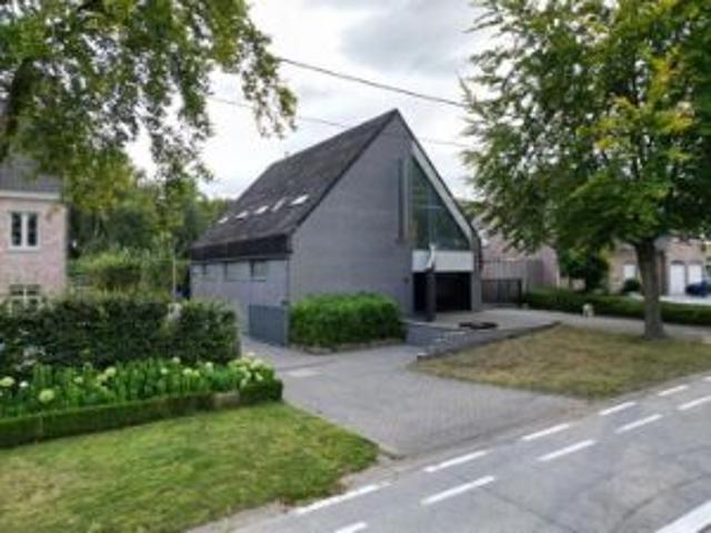 Instapklaar handelspand met woonst, parking + tuin