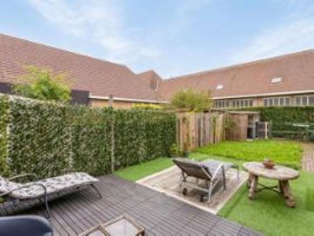 Instapklare woning met aangename tuin en garage