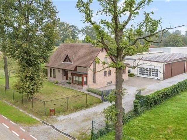 Instapklare woning met schrijnwerkerij/werkplaats