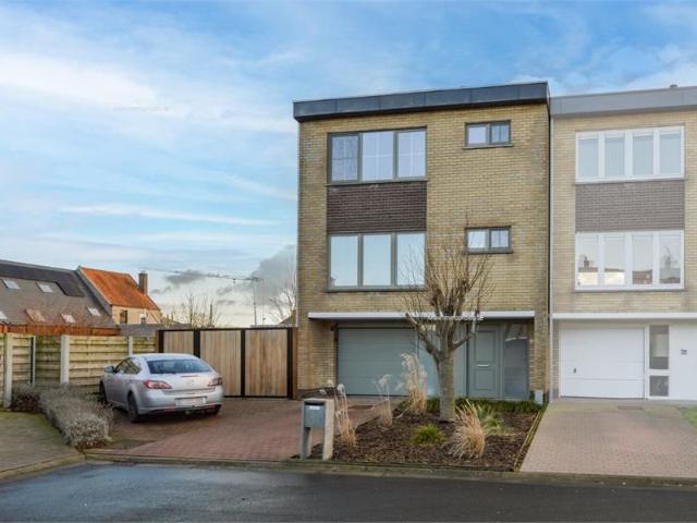 Instapklare woning met tuin en garage in rustige woonwijk