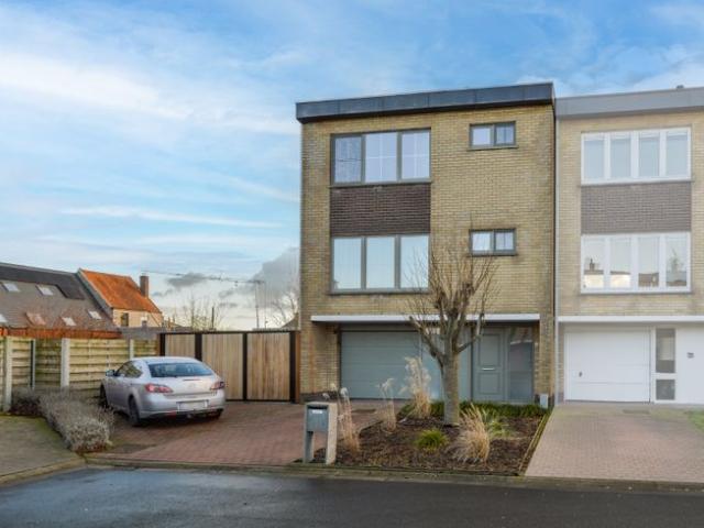 Instapklare woning met tuin en garage in rustige woonwijk
