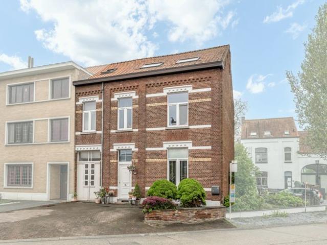 Instapklare woning met werkplaats te Vroenhoven