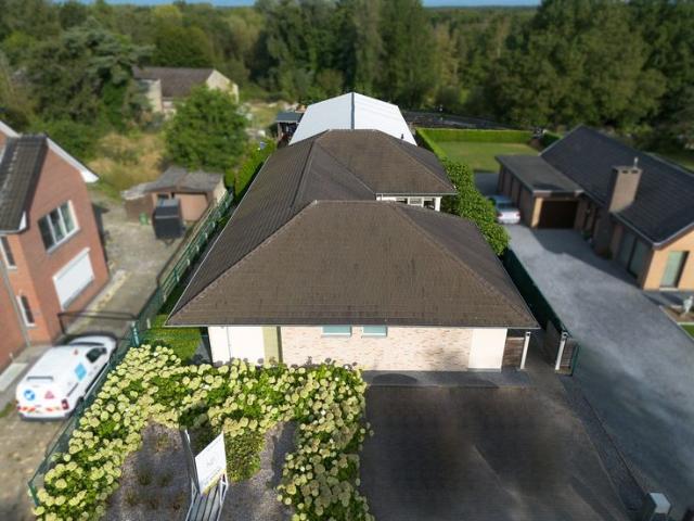 Energiezuinige gelijkvloerse woning met magazijn van 400.