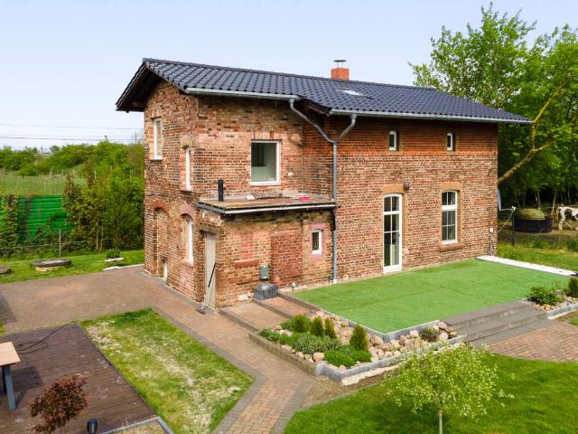 Interessantes Einfamilienhaus mit Loftcharakter auf sonnigem Gartengrundstück