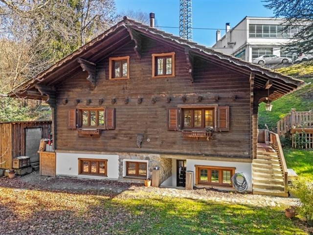 Investieren Sie in die Zukunft renoviertes Chalet mit Grundstück und Potenzial in Lausanne