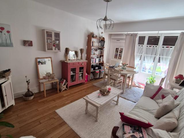 Investissement locatif sécurisé Grand T3 de 69 m2 avec loggia, parking, cave et grenier, dans le BOUCHON de