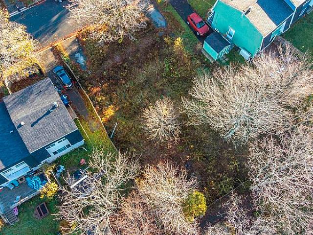 Investment Opportunity! Level Lot On Quiet Street