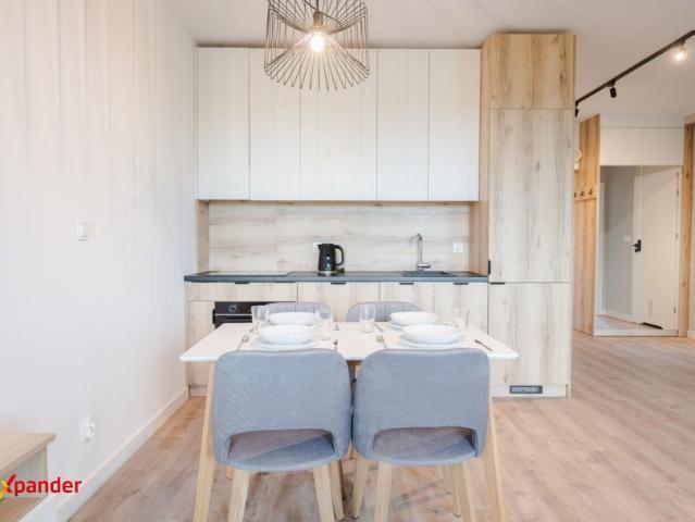 Inwestycyjny apartament z najemcą, klimatyzacją i garażem