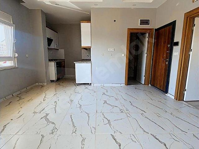 ÇIPLAKLIDA HASTANEYE YAKIN 1+1 GİRİŞ KATTA 60 M2 SATILIK DAİRE