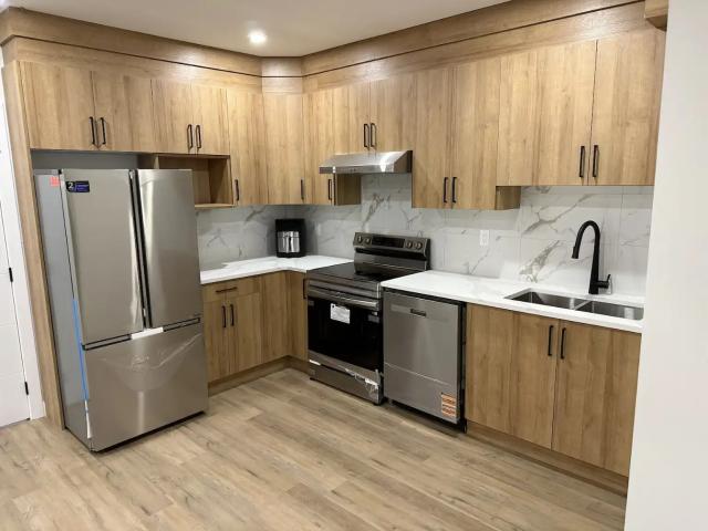 Irvin Creek 1 Bed + 1 Den Brand new Legal basement