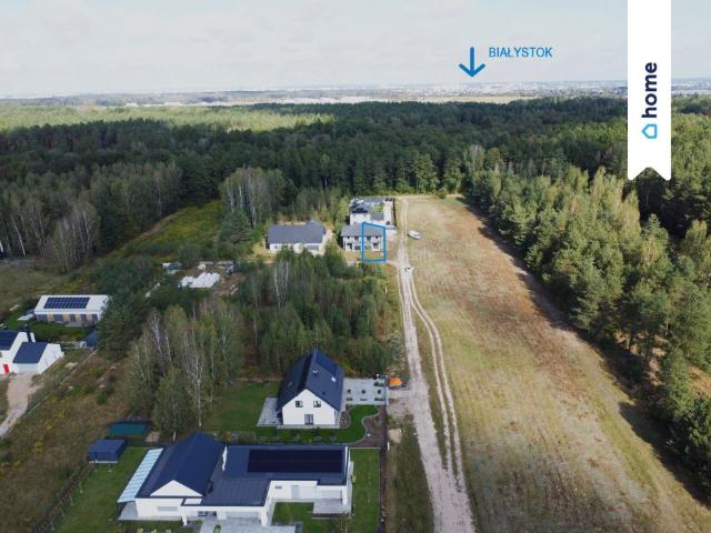 Nowoczesny dom 137 m² z kamieniem i drewnem, ogrzewanie podłogowe