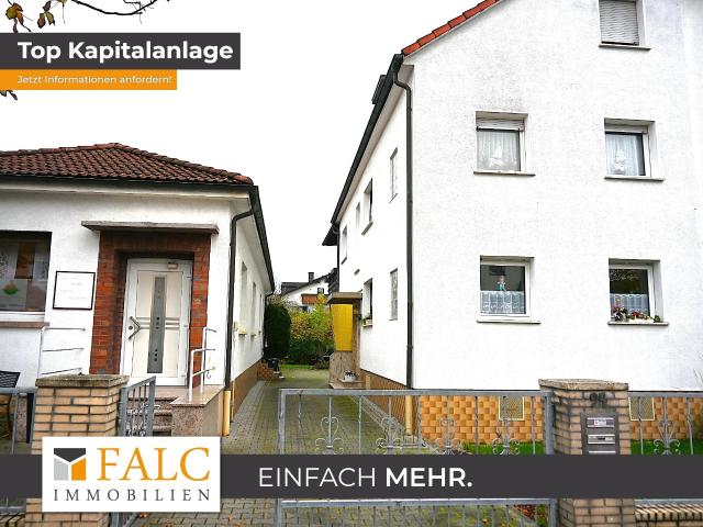 Attraktive Kapitalanlage mit großem Potenzial Zweifamilienhaus und Gewerbefläche in Dietzenbach!