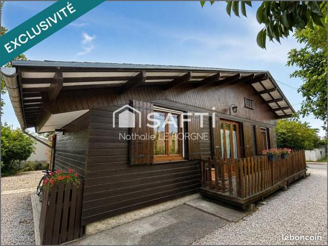 Joli chalet en bois avec dépendances sur terrain 1100 m²