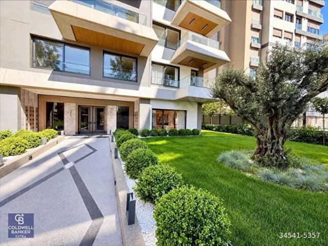 KALAMIŞ'TA YEŞİLLE İÇ İÇE, 724 GÜVENLİKLİ 125m2 3+1 BAHÇE KATI
