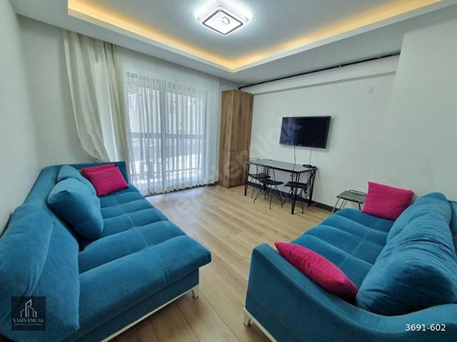 KAPALI MUTFAKLIMERKEZİ KONUMDAEŞYALI KİRALIK 1+1 DAİRE