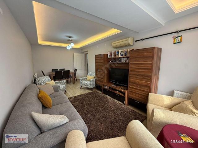 KARŞIYAKA BAHÇELİEVLERDE MERKEZİ KONUMLU SATILIK ARA KAT DAİRE