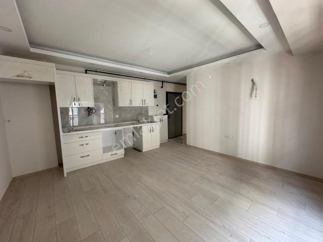Karşıyaka Bahçelievler'de Sıfır 1+1 Satılık Daire