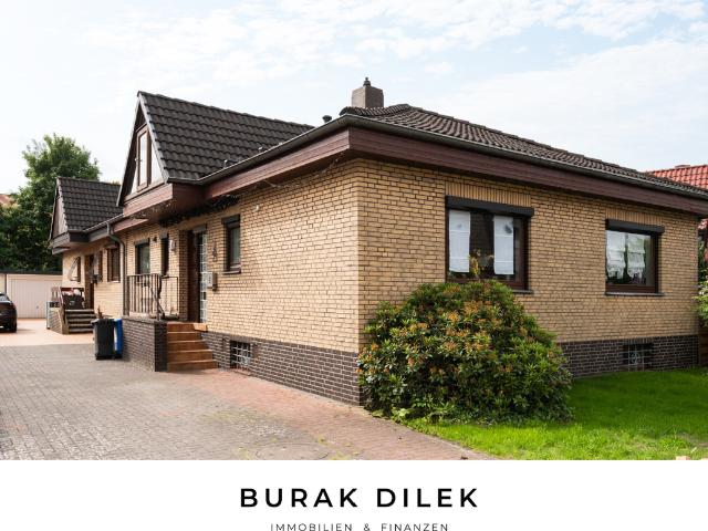 PREISAKTUALISIERUNG! Charmante Doppelhaushälfte im Bungalowstil mit Garten & Garage zum Verkauf!