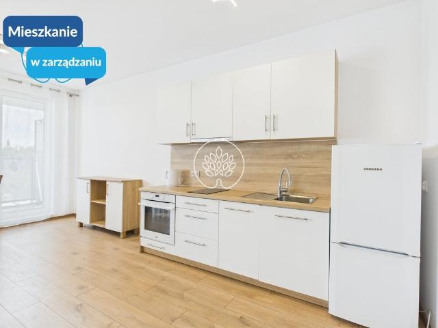 Kawalerka z balkonem, miejsce postojowe, blisko centrum