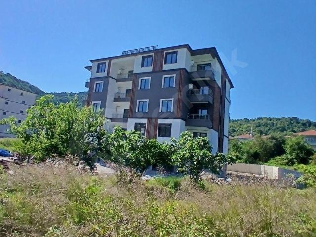 Kemerde sıfır ayrı mutfaklı ve manzaralı kiralık 1+1