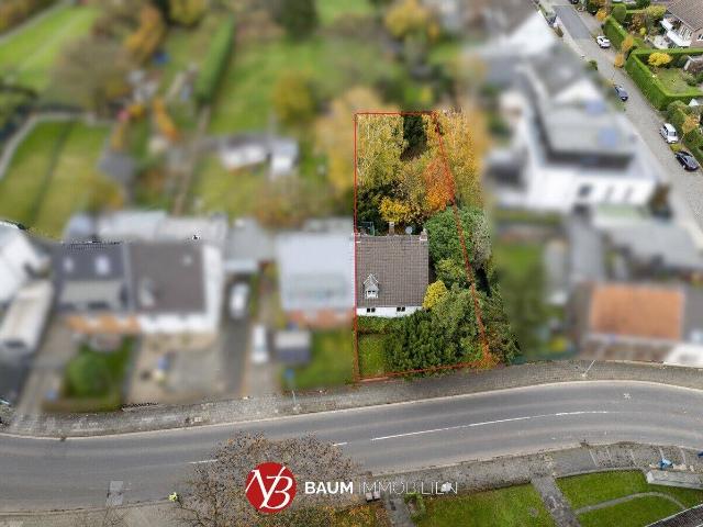 Kernsanierungsbedürftige Doppelhaushälfte mit großem Garten und Anbaumöglichkeit in Büderich