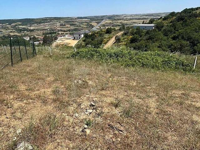 KESTANELİK'TE 250 m2. ÇAPLI MUVAFAKATNAMELİ TEPE KONUMDA TARLA