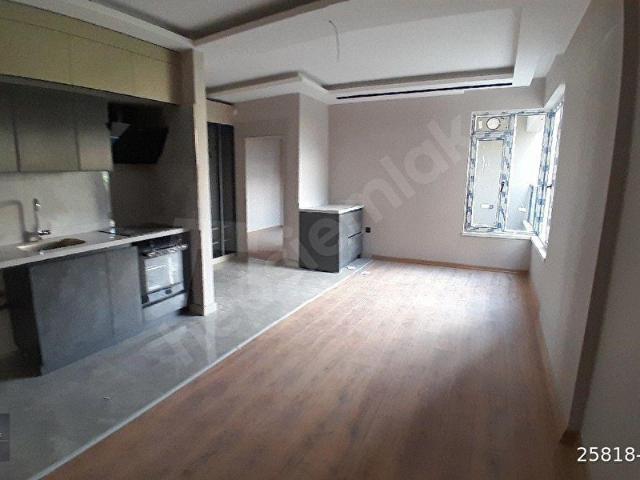 KİRALIK SİTE İÇERİSİNDE 1+1SIFIRYERDEN ISITMALI BALKONLU GÜNEY CEPHE