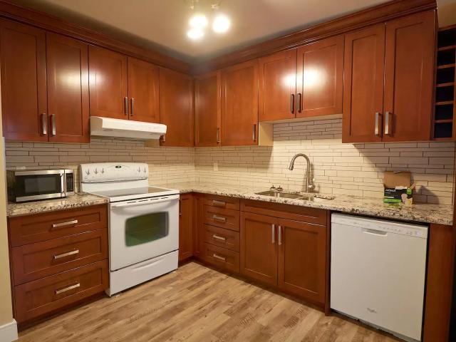 Killarney, Sept. 1, close in, HUGE Corner 2 Level Suite with Private Entrance