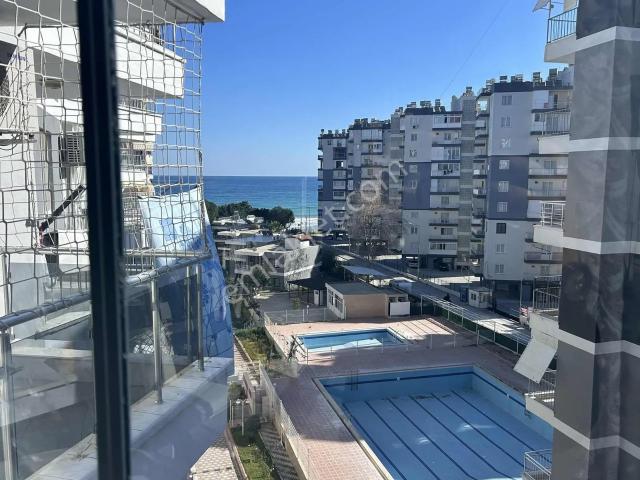 Kiralık Eşyalı Daire Tecede Denize Sıfır Havuzlu Yazlık